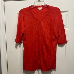Red shortsleeved cardigan sweater